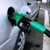 Filling a car with petrol image