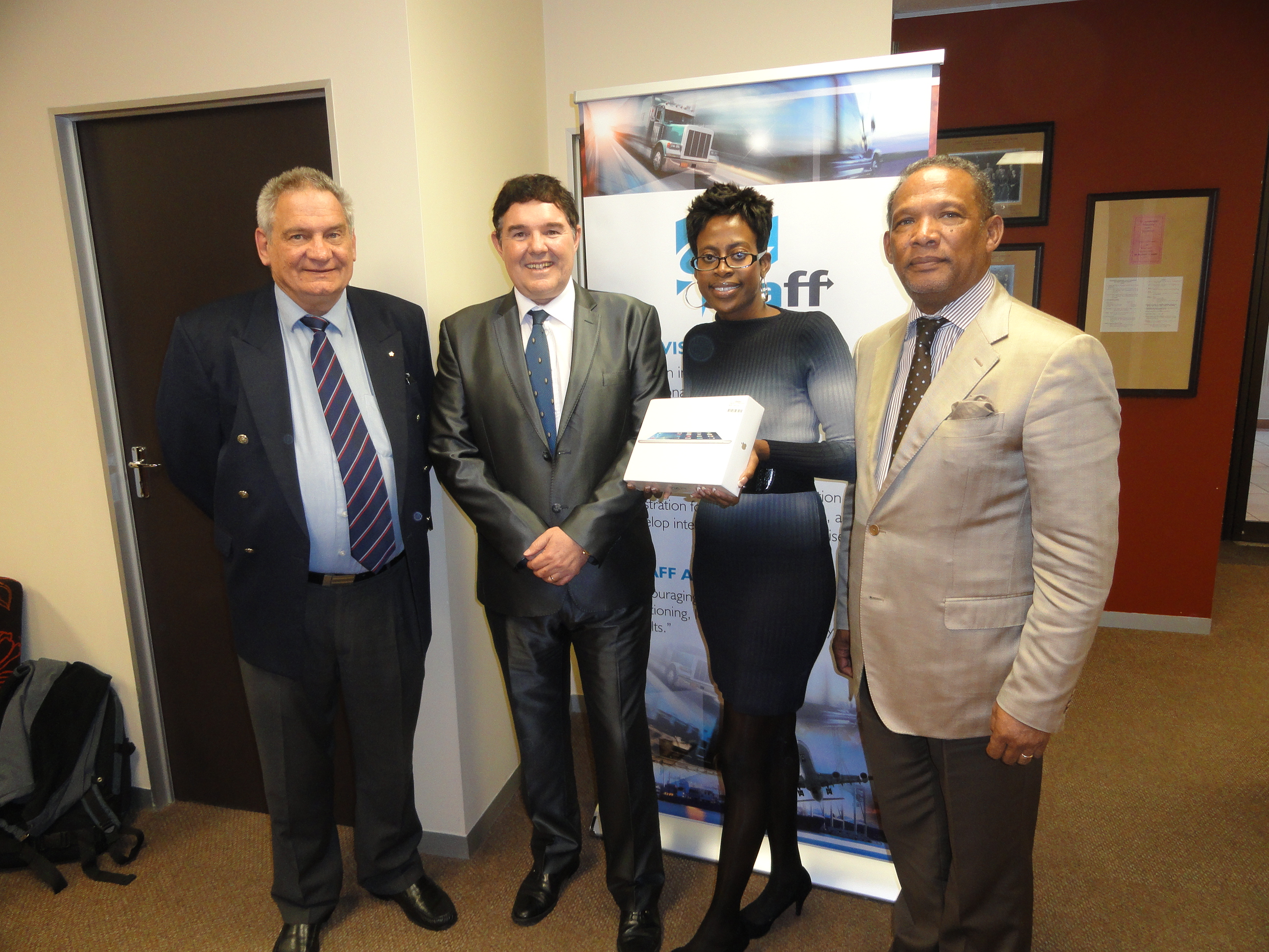 Charles Dey, Dave Walls, Fortunate Mboweni and Basil Pietersen, President of the South African Association of Freight Forwarders (SAAFF)