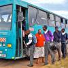schoolkids boarding a bus